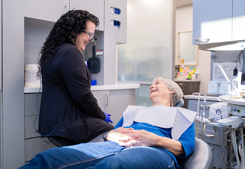 Senior patient speaking with our friendly dental staff at Tulsa Family Dental in Tulsa OK.