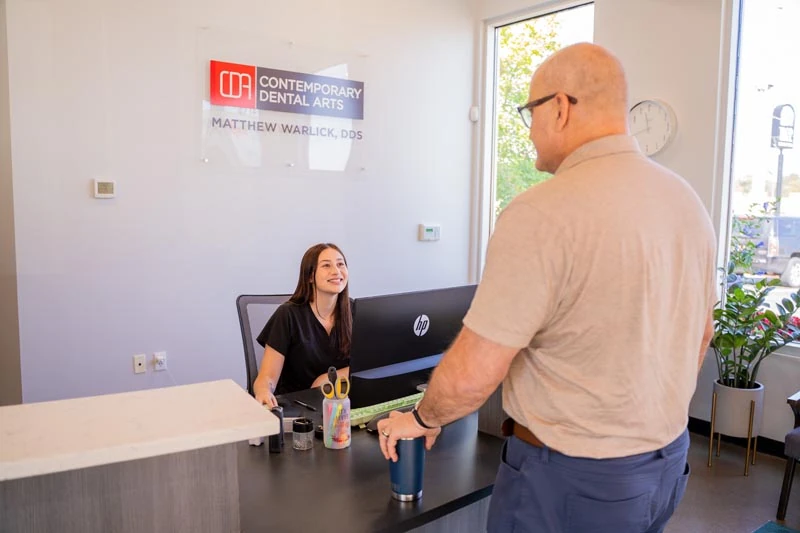 Friendly staff at Contemporary Dental Arts in Tulsa OK greeting a patient.