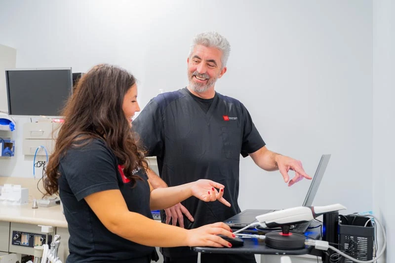 Patient in the exam chair speaking with the staff at Contemporary Dental Arts in Tulsa OK.